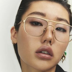 Elisa Johnson Jane in Gold Metal